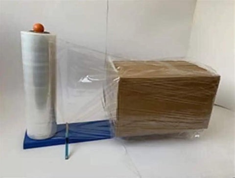 Manual Pallet Stretch Wrap Machine With 30 Cm Turntable And Quick Single Rod Dispenser Tool For Heavy Duty Industrial Packing wrapping a cardboard box.