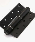 Black invisible door hinge with automatic closer and hydraulic spring damping, self-closing for cabinets and furniture.