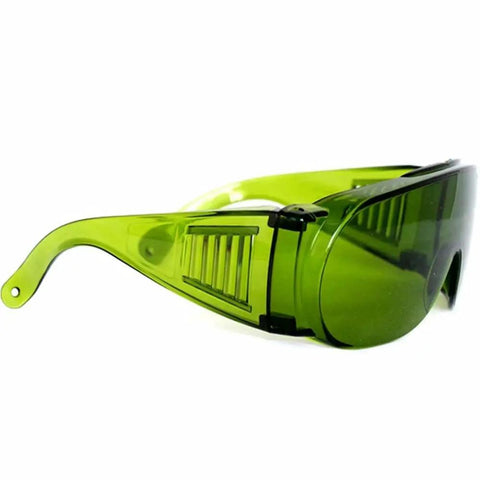 Top Tier Laser Safety Goggles With Wide Spectrum Filtering And Slick Polycarbonate Frames Built Tough For Heavy Duty Shop And Lab Tasks featuring green lenses.