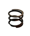Top Shelf Spring Compression Assembly Original Replacement For Cummins Diesels And White Skid Steers, close-up view of a metal spring.