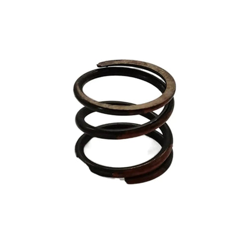 Top Shelf Spring Compression Assembly Original Replacement For Cummins Diesels And White Skid Steers, close-up view of a metal spring.