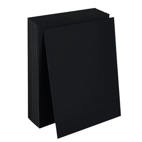 Black Corrugated Cardboard Sheets 37x26 Inches 50 Pack E Flute Thick 3 32 Inch Made In USA stacked on white background