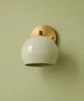 Modern Brass Wall Sconce Light Fixture, Hardwired Wall Lamp with white shade, perfect for bathroom vanity or bedroom use.