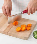 Haofy potato crinkle slicer, front view, stainless steel with red handle, kitchen tool