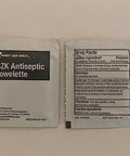 Two First Aid Only BZK Antiseptic Towelette sachets; left shows label, right shows drug facts panel.