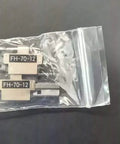 Premium 12 Core Ribbon Fiber Holder Sheath Clamps And Chucking Jigs For Fsm-70r Fiber Optic Tools Model FH-70-12 in packaging.