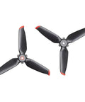 High Performance FPV Drone Propellers for FPV Rigs Durable Easy Mount Balanced Blades for Quick Throttle Response Steady Hover and Smooth Crash Proof Maneuvers, shown in a black finish with red tips, highlighting blade design for precision flight.
