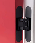 Slick Invisible Door Hinges With 3D Adjustable Bearing Concealed Fixing Slow Close Zinc Alloy Butt Hinge in black on red and white doors.
