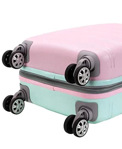 Hardside carry-on spinner luggage, mint and pink two-tone, 20-inch with four wheels.