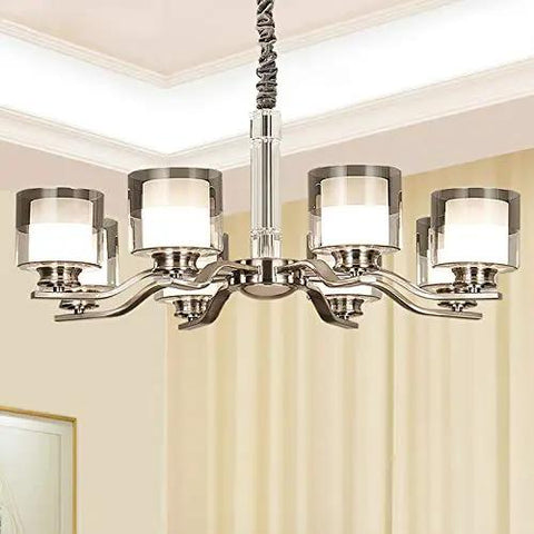 Slick Nickel Four Bulb Led Pendant Chandelier casts pure 5500k white light, featuring a sleek design with four glass shades.