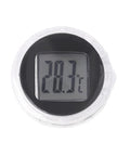 Digital thermometer with round display and silver bezel, waterproof stick-on unit showing 20.3°C