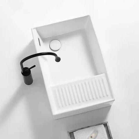 USZWBY Vessel Sinks Nordic Ceramic Table Basin Side Corner Drainage Washing Machine with sleek black faucet.