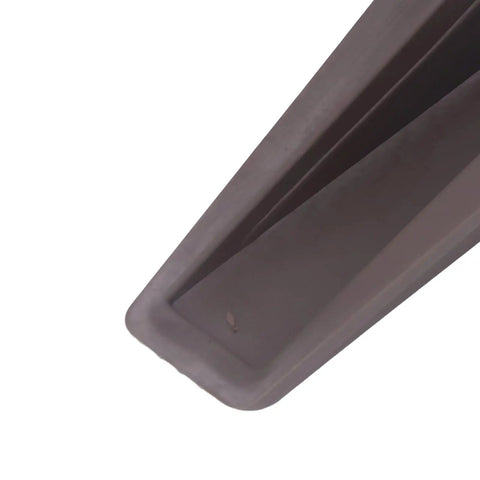 Close-up of TPR wedge from 10 Pack TPR Wedge Door Stops for Home Office Durable No Punching Design Flexible Rubber for Carpet Tile Wood Floors Reduces Collision Noise and Ground Damage on Slick Surfaces.