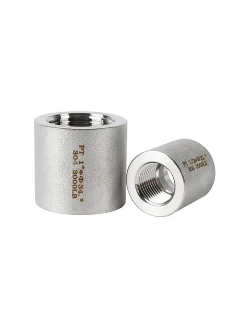 Socket Weld Reducer 304 Stainless Steel Pipe Fitting Female NPT BSPT Adapter High Pressure Connector Tough As Nails Design For Serious Plumbing Sizes 1/4 To 2 In. close-up view of two stainless steel reducers.