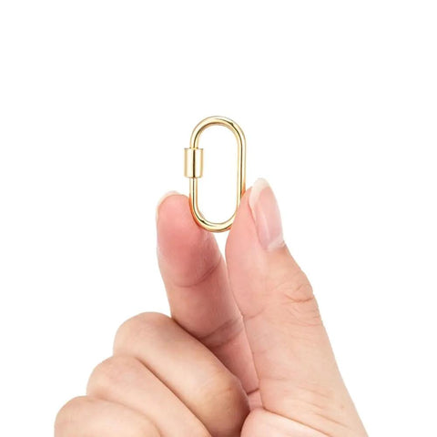 Golden Screw Carabiner Lock Charms Set For Jewelry Making Brass Oval Quick Clasp Connectors held between fingers showing size