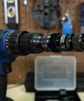 Frankford Arsenal Universal precision case trimmer attached to a drill; knurled ring visible, storage case behind.