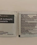 First Aid Only BZK antiseptic towelette sachet; back label shows ingredients and directions