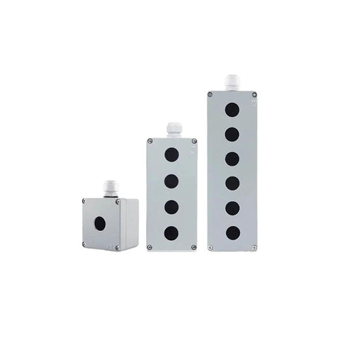 Three silver cast-aluminum push-button switch boxes with 22mm knockouts on front panels: 1-hole, 4-hole, and multi.