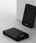 Black Portable External Hard Drive 1TB USB 3.0 USB-C Storage Expansion For PC Mac Desktop Laptop PS4 Xbox, angled view.