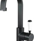 Paris Single Handle Matte Black Bathroom Faucet With Deck Plate And Drain For One Or Three Hole Mount Drip Free Ceramic Disc 1.2 GPM At 60 PSI Generous Seven And Thirteen Sixteenths Inch Spout Clearance Built To Last With Brass Construction, front view showing handle detail.