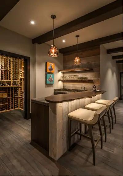 Badass Mahogany Reactive Wood Stain For Knockout Deep Warm Brown Tannin Activated Finish used on bar countertop in a rustic setting.