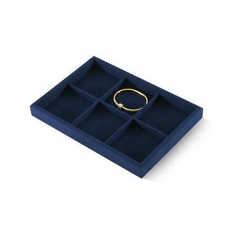 Super Slick Microfiber Jewelry Display Tray With Six Grid Compartments For Ring Earring Bracelet And Necklace Storage Stackable Countertop Organizer Plate Hits Different with a gold ring.