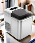 Countertop Ice Maker With Slick Remote Control And Hassle Free Self Cleaning Yields Fast Spherical Cubes In A Snap on kitchen counter.