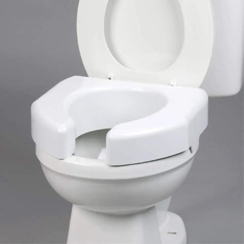 Three Inch Booster Elevated Toilet Seat Riser For Seniors And Disabled, Easy Install, White, Fits Most Standard And Elongated Toilets, Durable Plastic Comfort, Raised Seat To Make Potty Time Easier on white toilet