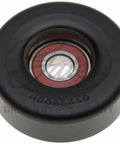 DriveAlign belt drive idler pulley, automotive part, Amazon brand, front view with black pulley and red bearing hub.