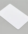 Top Shelf Two Hundred Thirty White Blank Pvc Cards Waterproof Inkjet Printable Id Business Size No Chip Easy Load flat white card on gray background