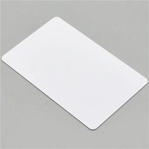 Top Shelf Two Hundred Thirty White Blank Pvc Cards Waterproof Inkjet Printable Id Business Size No Chip Easy Load flat white card on gray background
