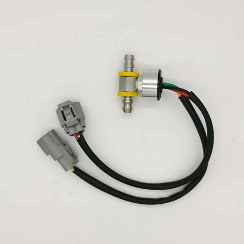 Brake booster vacuum pump kit, front view; 12V, silver pump, yellow seals, gray connectors, black wires