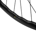 Close-up of Carbon Disc Wheelset With Wave Rim 50CU 25 CC Thru Axle 12x100 for road and gravel bikes, showing 50mm rim depth.