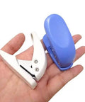 Two Pack Mini Hole Punch Set Handheld 6mm Single Hole Punches White And Blue Portable Punch Tool held in hand