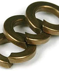 Three Quarter Inch Silicon Bronze Split Ring Lock Washer Set Of 25, Helical Spring Style Hardware, close-up view of lock washers.