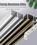Close-up of Beefed Up Heavy Duty Aluminum Sliding Barn Door Hardware Kit with double bypass aluminum tracks and rollers.