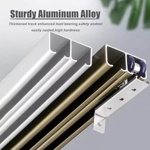 Close-up of Beefed Up Heavy Duty Aluminum Sliding Barn Door Hardware Kit with double bypass aluminum tracks and rollers.