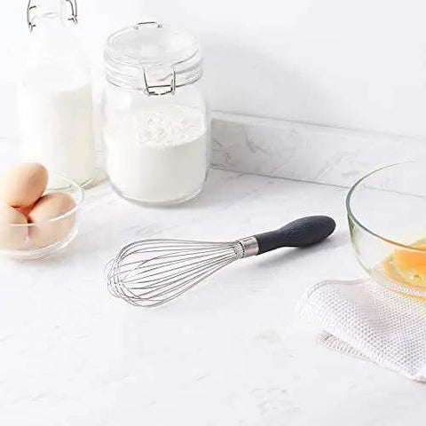 Stainless Steel Balloon Whisk Set 3 Piece With 9 Inch 10 Inch And 11.5 Inch Sizes Easy Grip Ergonomic Handle in a kitchen setting