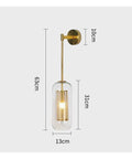 Lowkey Chill Modern Wall Sconces With Smooth Glass Shades And Glare Free LEDs That Really Bring Premium Vibes To Living Rooms And Bedrooms For Total Home Glow Up, 63cm tall wall sconce with golden frame and glass shade.