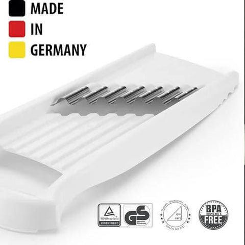 Front view of white Börner Wave-Waffle XXL Power Line vegetable slicer with stainless-steel blades.