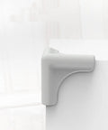 Silicone Corner Guard 8 Pack Protects Table Edges From Bumps And Collisions on white table, kid safe and pet friendly