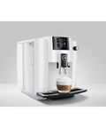 Straight Up Game Changer Automatic Espresso Coffee Maker With Easy Cappuccino Function And Premium Aroma Grinder In Sleek Piano White Finish pouring a latte.