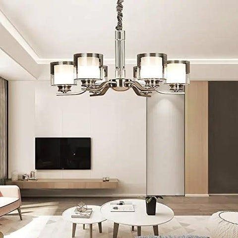 Slick Nickel Four Bulb Led Pendant Chandelier Casts Pure 5500k White Light To Instantly Level Up Your Living Room Dining Setup With Smooth Modern Vibes Today, featuring a sleek metal frame and four light sockets.