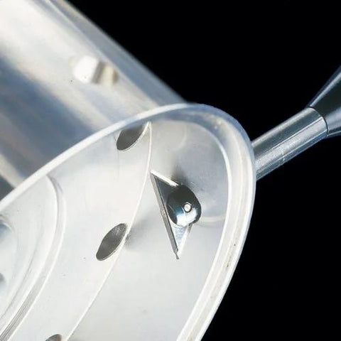 Close-up of Noga RC2200 large reversible deburring tool holder, silver metal housing with cutting blade.