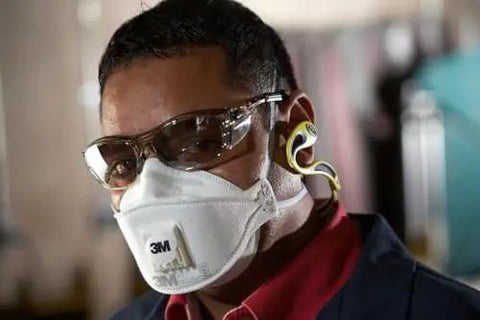 Person wearing Safety Glasses With Built In Readers Plus 2.0 Diopter For Reading And Eye Protection ANSI Z87 Clear Lens