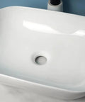 USZWBY Vessel Sinks Square Rounded Corner Simple Sink Ceramic Above Counter Wash Basin close-up view of smooth white ceramic basin.