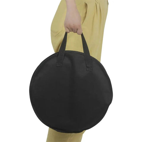 Hella Tough Octopus Practice Pad Storage Bag For 10 Inch Dumb Drum Slick Oxford Cloth being carried, black, round, durable design.
