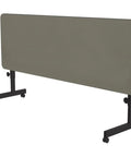 No Fuss Adjustable Flip Top Standing Desk Built Tough For Quick Workspace Swaps Locking Casters view with sand laminate surface and black base.