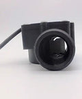 Front view of Liquid Flow Sensor Water Flowmeter for 1.25 Inch Pipes DN32 1 to 120 Liters per Min Turbine Type, black plastic body.