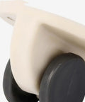 Close-up of Peel And Stick Swivel Casters Smoother Than Snow ABS Ball Bearing for easy furniture mobility.